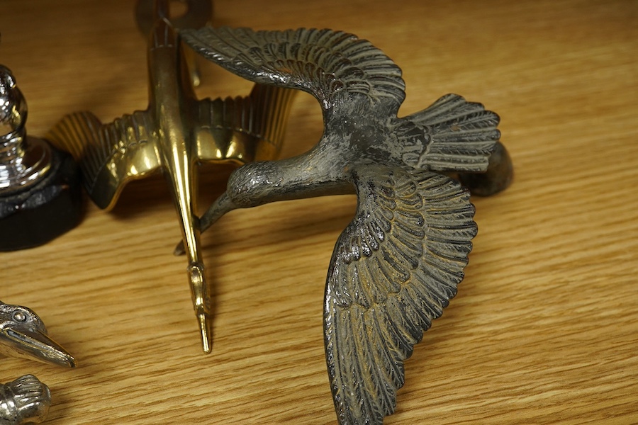 Six bird themed car mascots, including an Hispano Souza style flying stalk, a small parrot, a flying crane, an eagle perched on a ball, and a 14th/20th King’s Hussars crowned eagle, some examples chromed. Condition - fai